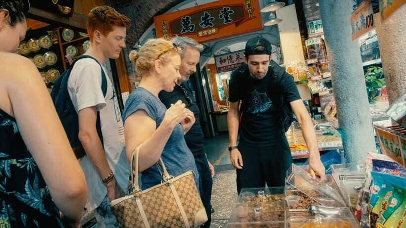 Taipei: 4-Hour Morning City Cycling Tour with Breakfast - DiHua Historical Street: the trading lanes that shaped daily life