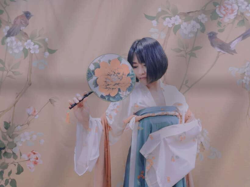 Wear Hanfu and play guzheng - Photos, Posing, and the Instructor’s Role Beyond Music